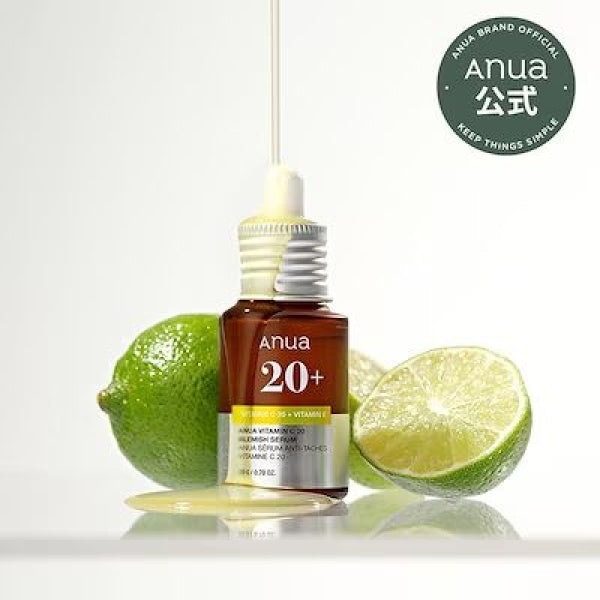 Anua skincare serum bottle with lime fruits on a white background