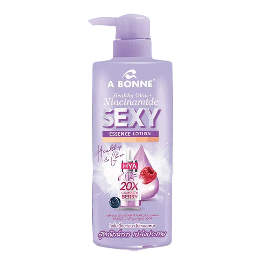 A bottle of A Bonne Sexy Essence Lotion with a lavender background