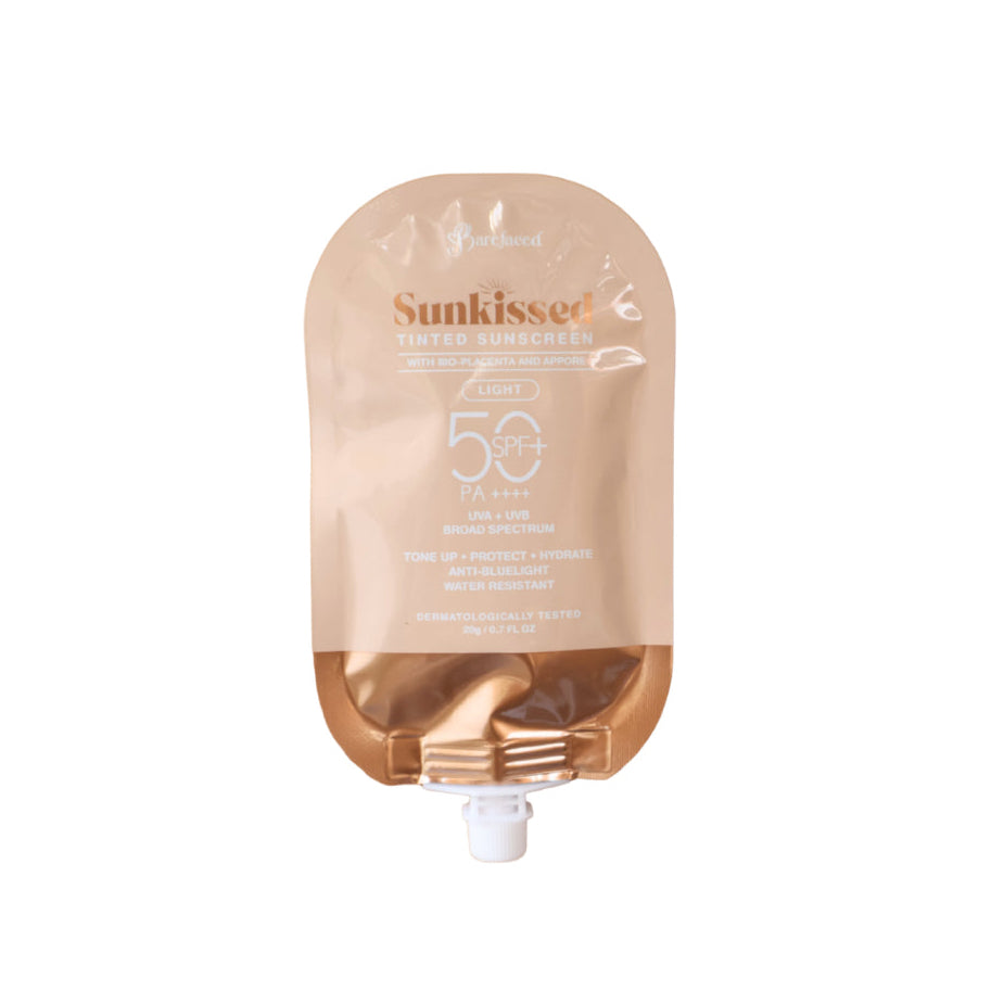 Sunkissed sunless tanner pump bottle on a white background