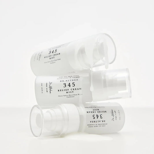 Three bottles of Dr. Althea 345 Relier Cream Mist on a white background