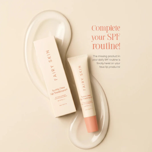 Fairy Skin Sunny Dew lip treatment with packaging on a beige background