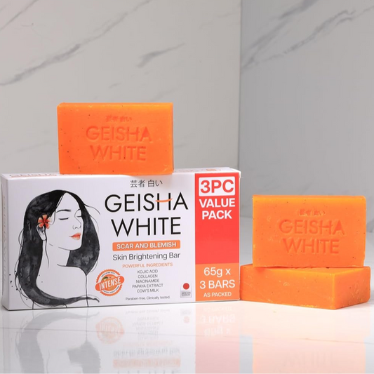 Geisha White skin brightening bars and packaging on a marble background