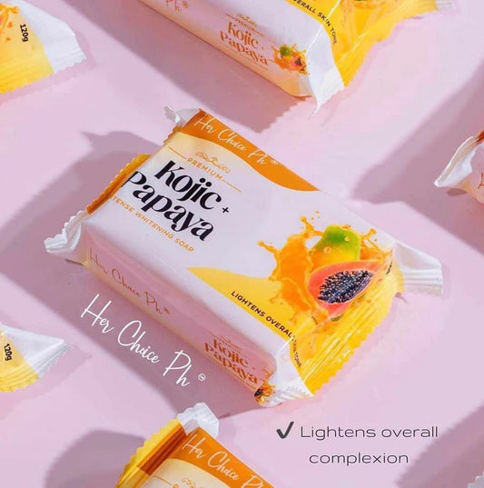 Kojic Papaya soap packaging on a pink background