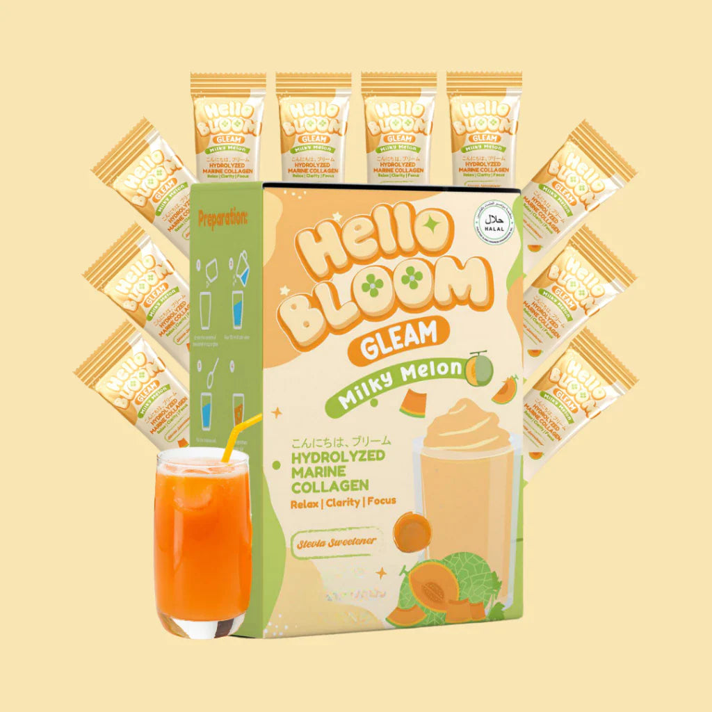 Hello Bloom Milky Melon collagen powder packaging with a glass of orange juice on a beige background
