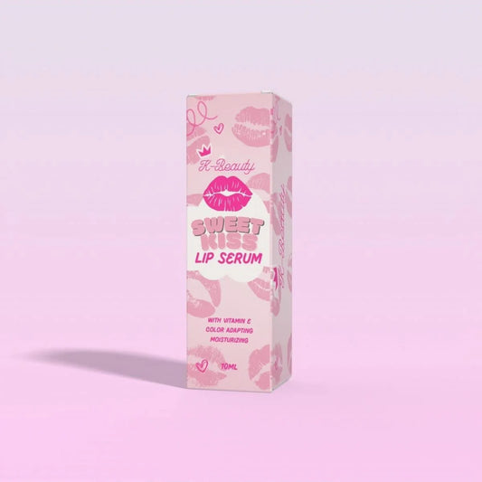Box of Sweet Kiss Lip Serum with pink and white design on a light purple background