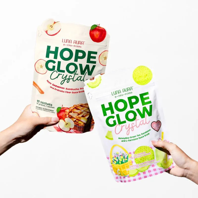 Two packages of Luna Aura Hope Glow Crystal on a white background