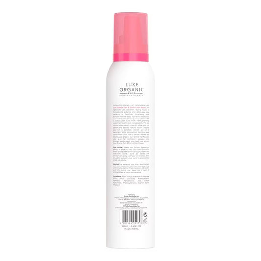Luxe Organix hair product bottle with pink cap on a white background