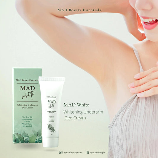 MAD White Whitening Underarm Deo Cream packaging with a person wearing a tank top on a light background.