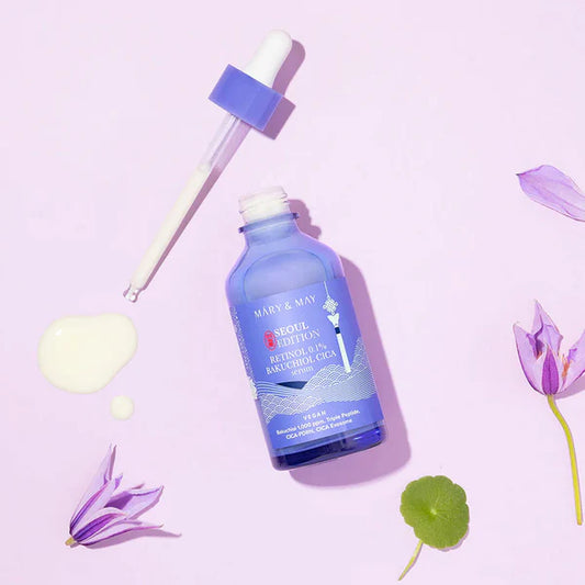 Blue bottle with dropper labeled 'Mark & May' on a light purple background with floral elements.