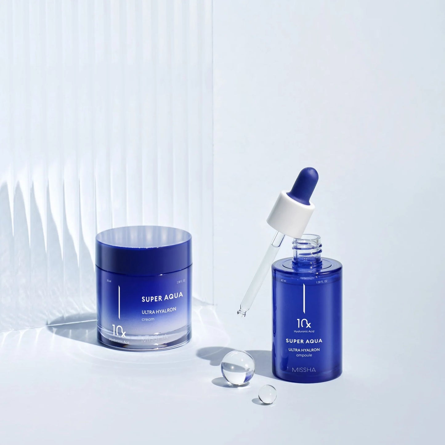 Super Aqua skincare products on a light blue background