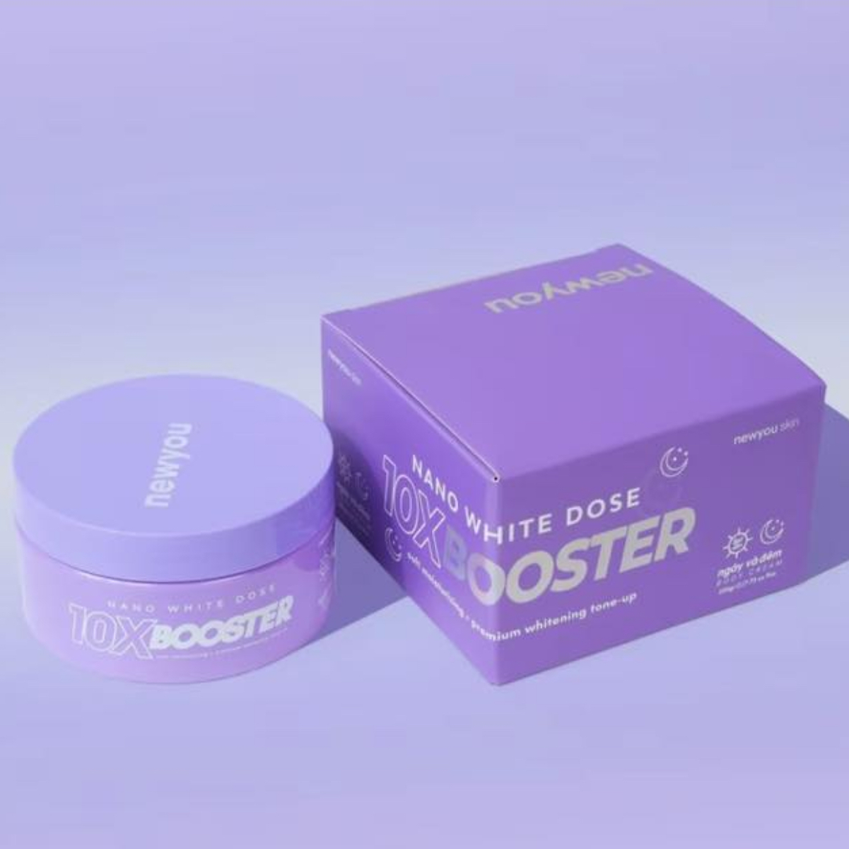 Purple '10X Booster' container and box on a light purple background