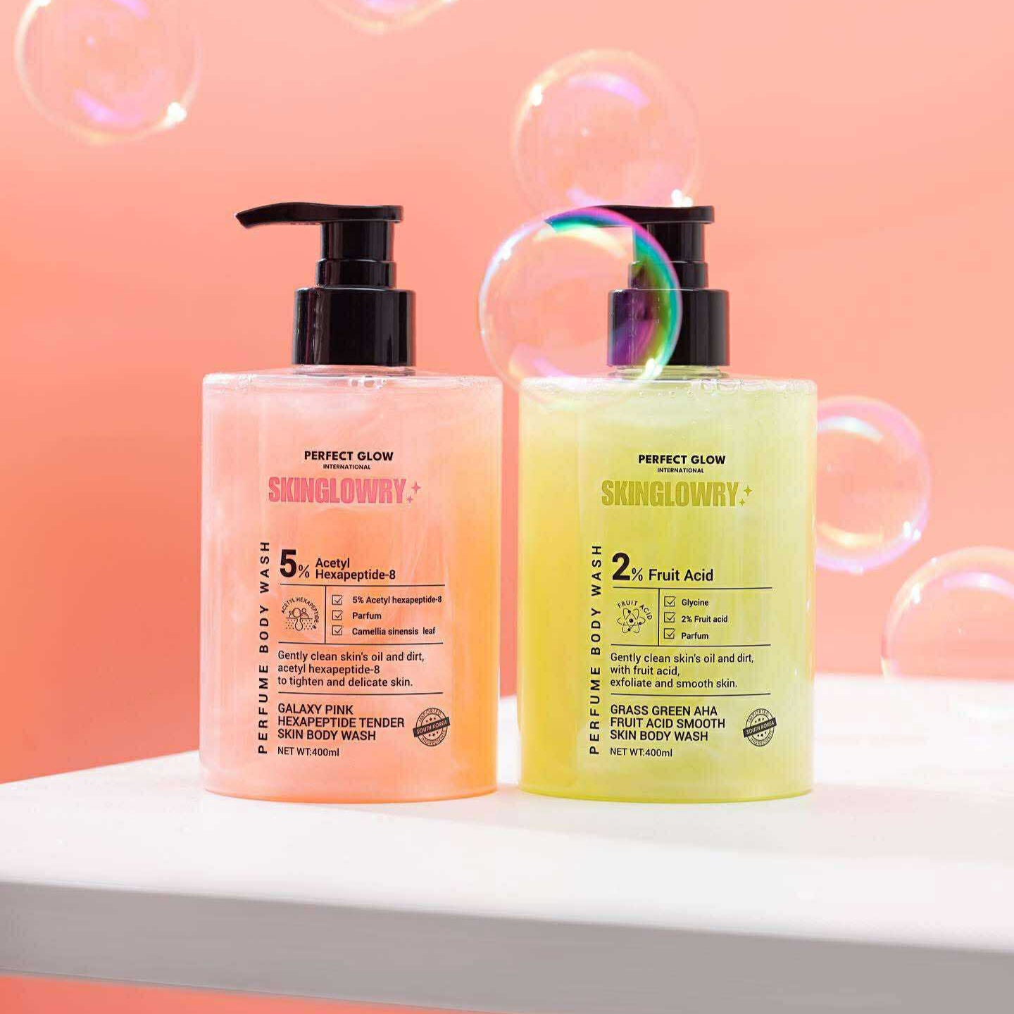 Two bottles of skincare products with a gradient background and bubbles.