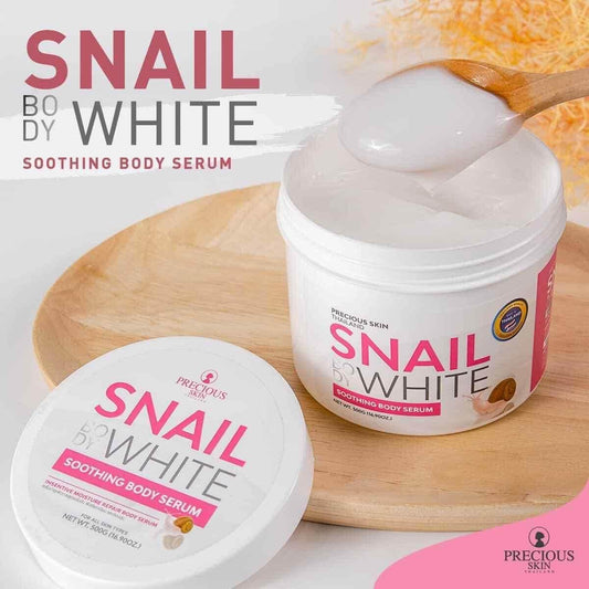Snail Body White soothing body serum jar with wooden spoon on a white background
