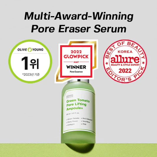 Green tomato pore eraser serum with awards on a gray background