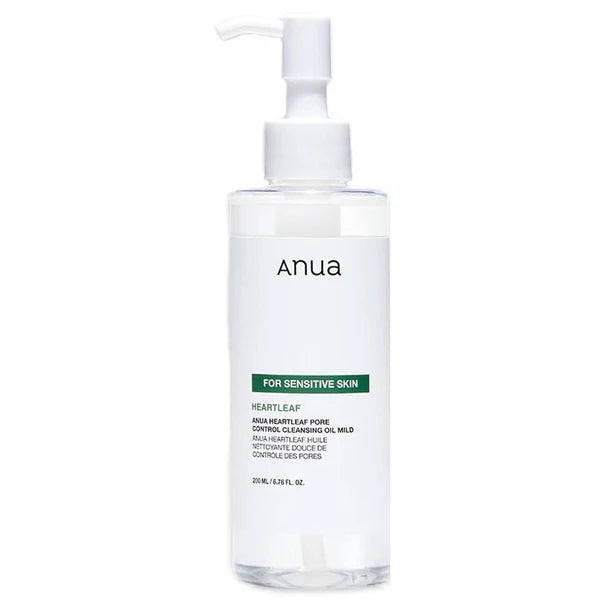A white pump bottle labeled 'ANUA' for Heartleaf Pore Control Cleansing Oil, mild for sensitive skin.