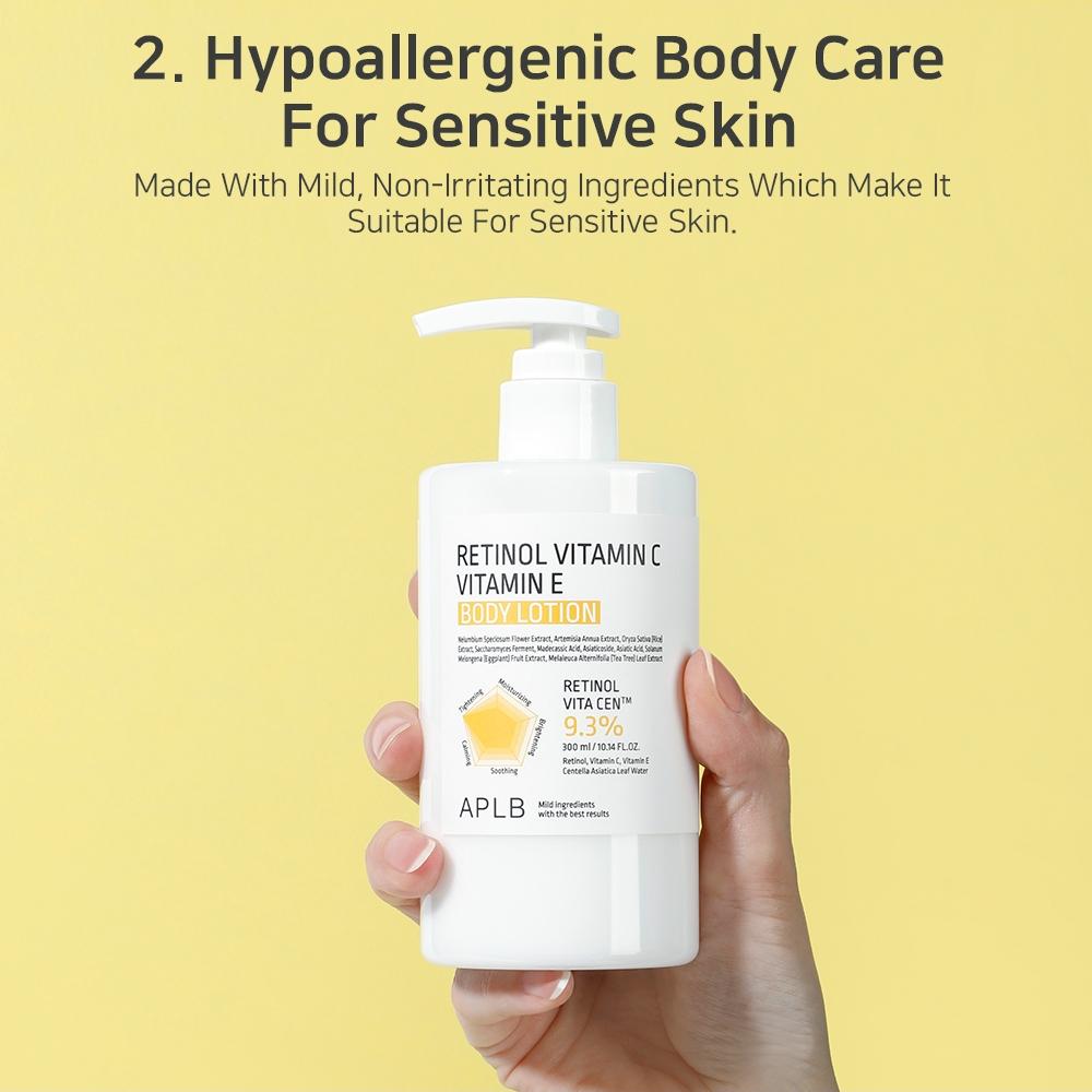 Hand holding a bottle of retinol vitamin C and vitamin E product with text about hypoallergenic body care for sensitive skin on a yellow background.