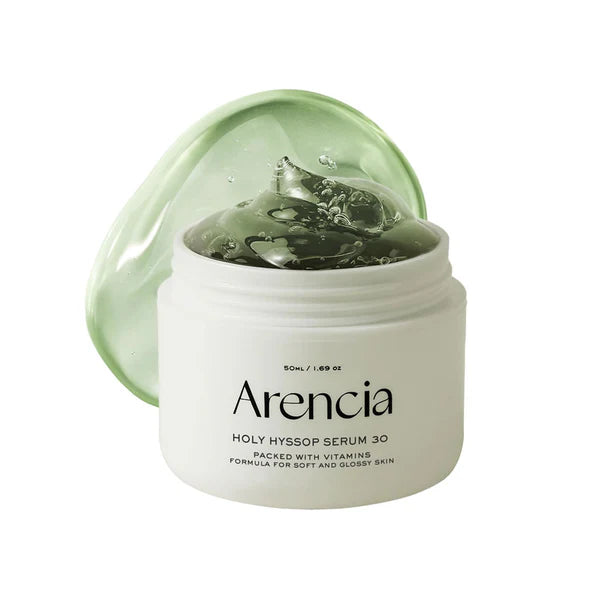 Skincare product jar with green cap on a white background