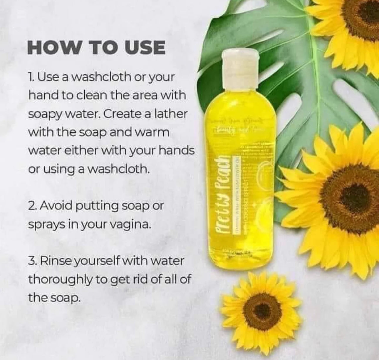 Yellow bottle of soap with sunflower design on a light background