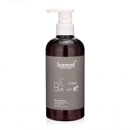 Bremad Cocoa Butter conditioner bottle on a white background