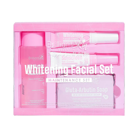 A pink-colored whitening facial set including various skincare products in a clear plastic packaging, labeled for enhancing skin tone and reducing blemishes.