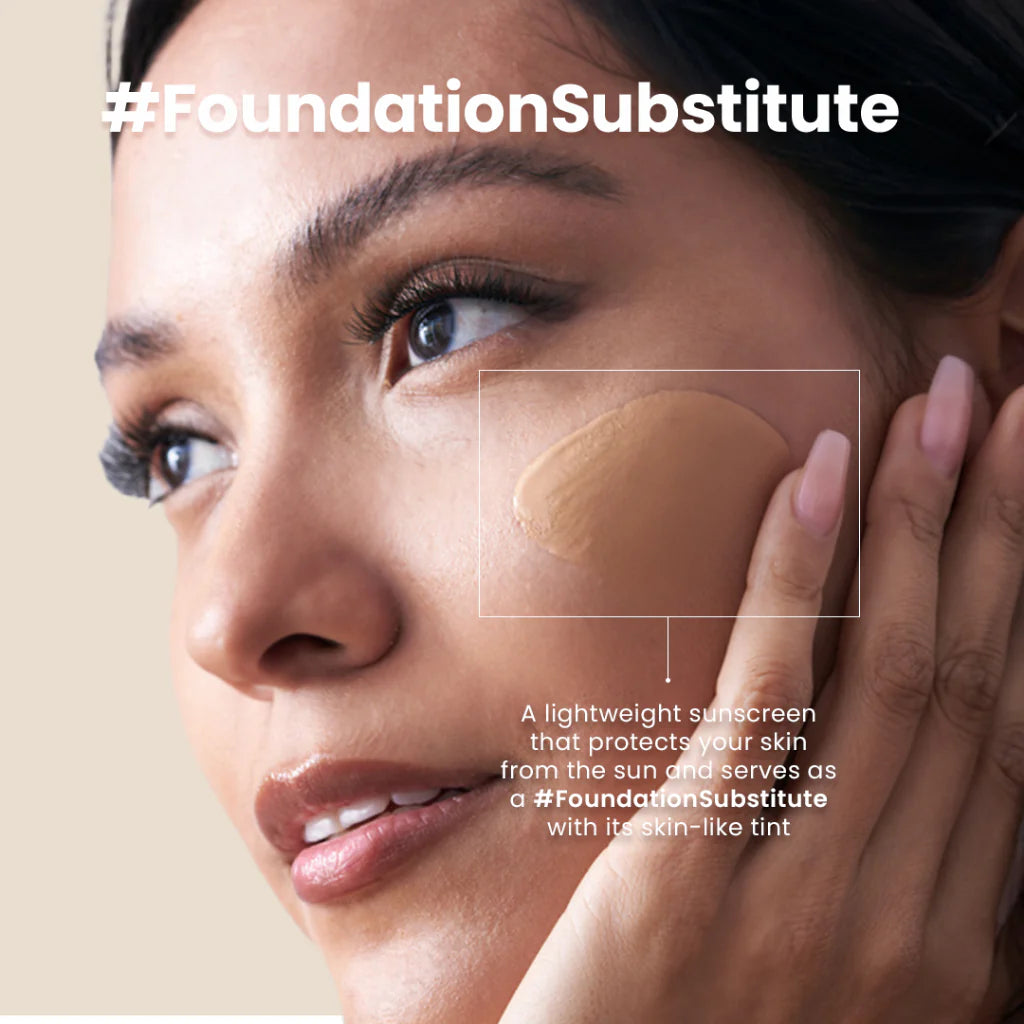 Woman applying a beige product to her face with text about '#FoundationSubstitute'.