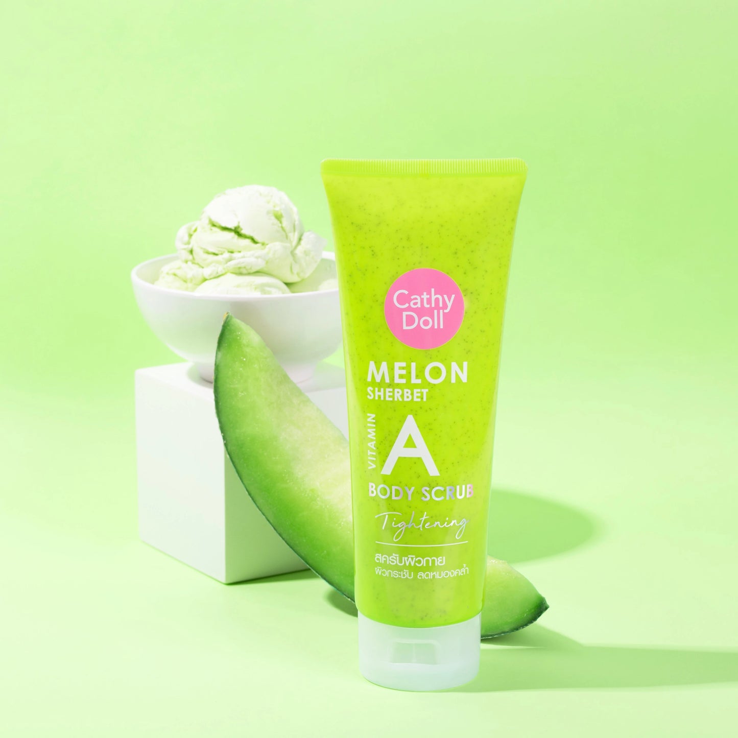 Cathy Doll Melon Sherbet A Body Scrub with a slice of melon and ice cream on a green background