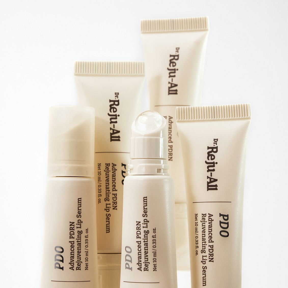 Set of skincare products with 'Reju-All' branding on a white background