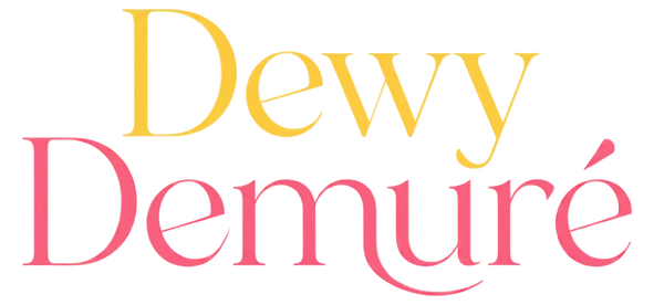 Text 'Dewy Demure' in yellow and pink on a white background