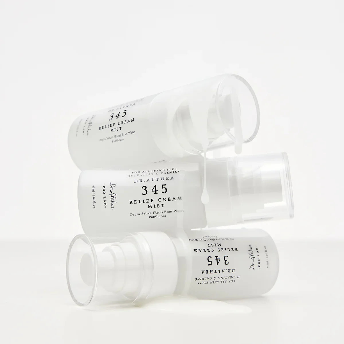 Three bottles of Dr. Althea 345 Relier Cream Mist on a white background