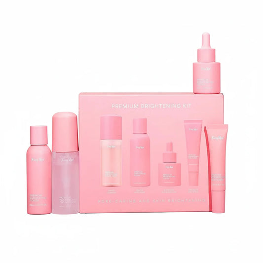 Pink skincare product set with bottles and a box on a white background