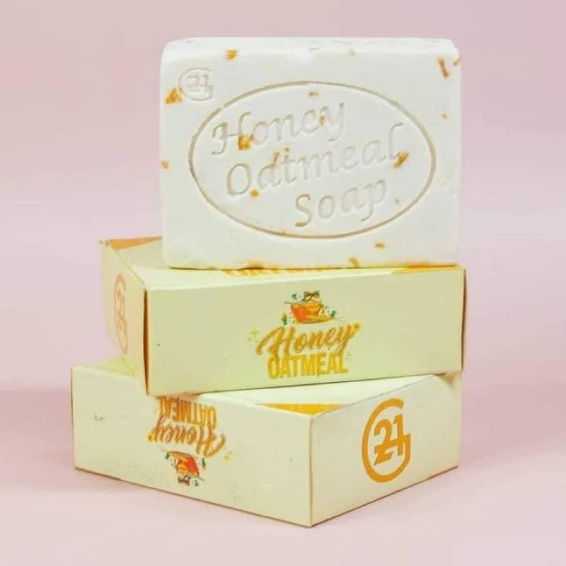 Honey Oatmeal soap bar with packaging on a pink background