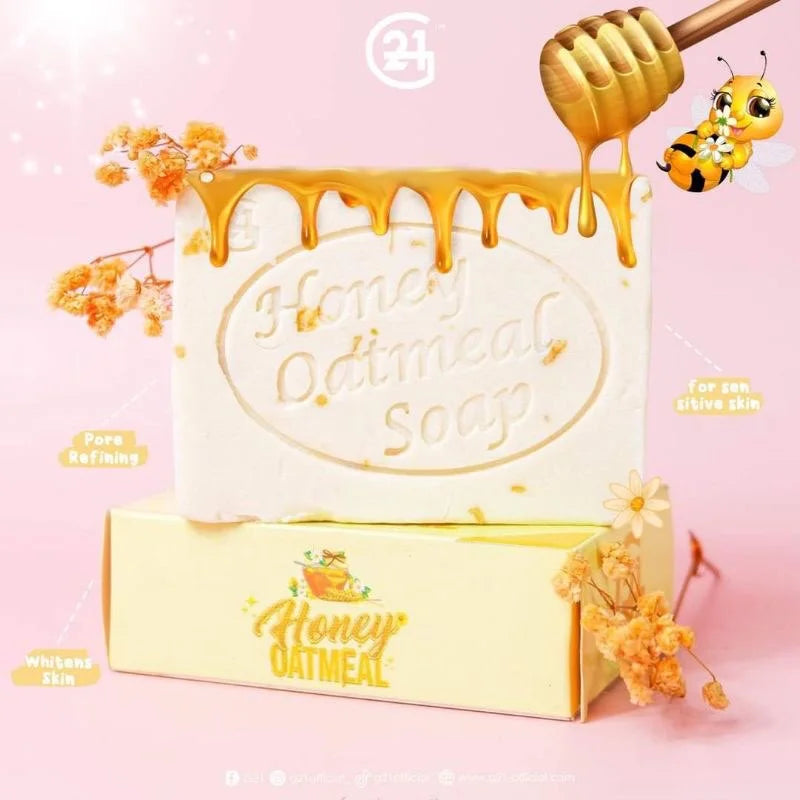 Honey oatmeal soap with honey drizzling over it on a pink background