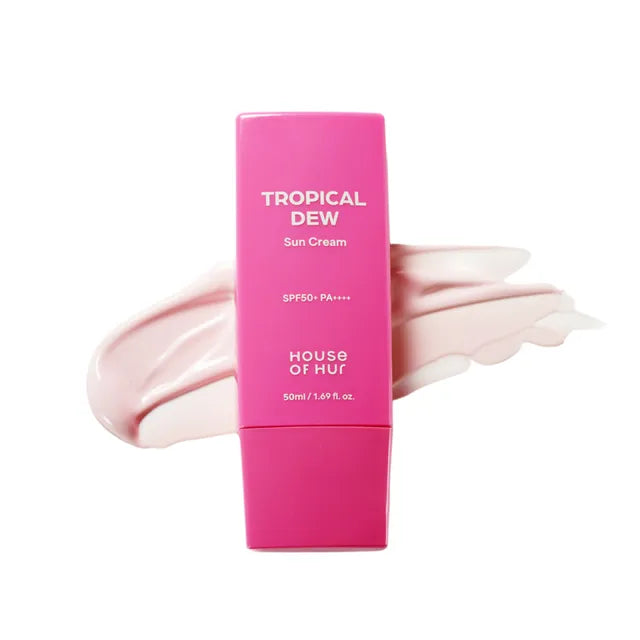 Pink sun cream bottle labeled 'Tropical Dew' by 'House of Hur' on a white background.