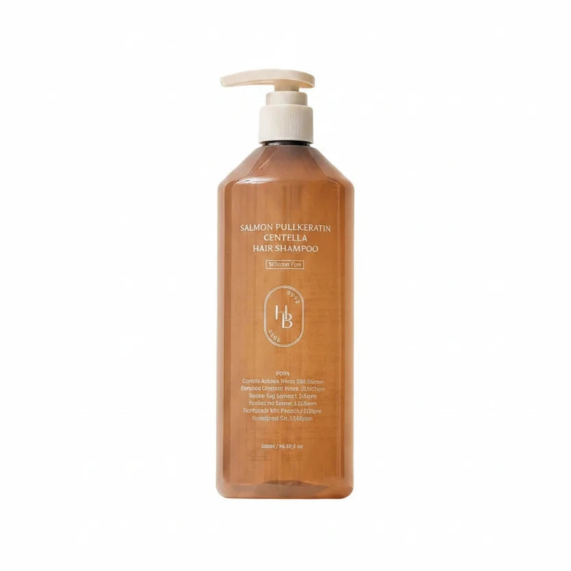 Brown shampoo bottle with pump on a white background