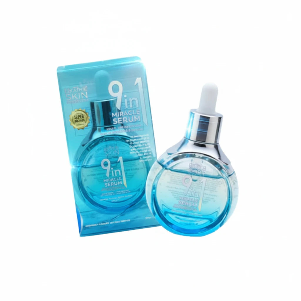 Blue serum bottle with packaging on a white background