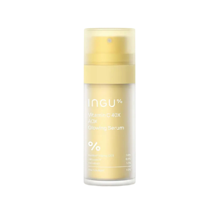Skincare serum bottle with yellow cap and label on a white background