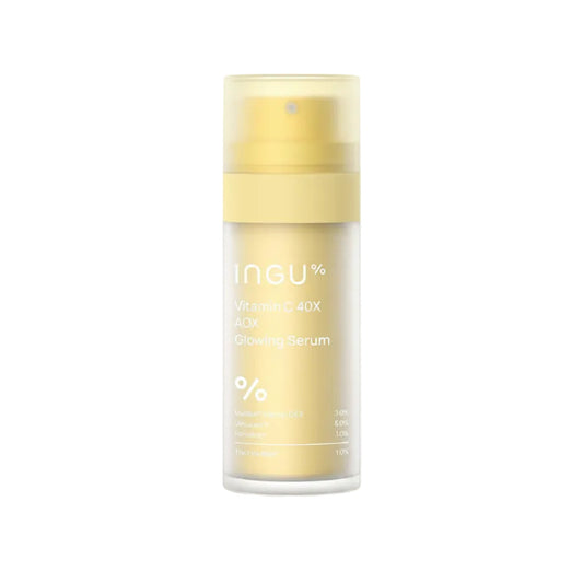 Skincare serum bottle with yellow cap and label on a white background