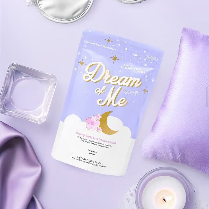 Sheet mask with 'Dream of Me' branding on a purple background with a candle and satin fabric.