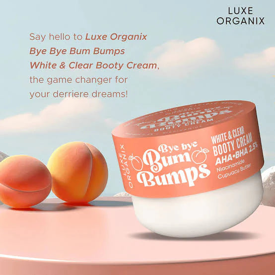 Luxe Organix Bye Bye Bum Bumps White & Clear Booty Cream with peaches on a light background