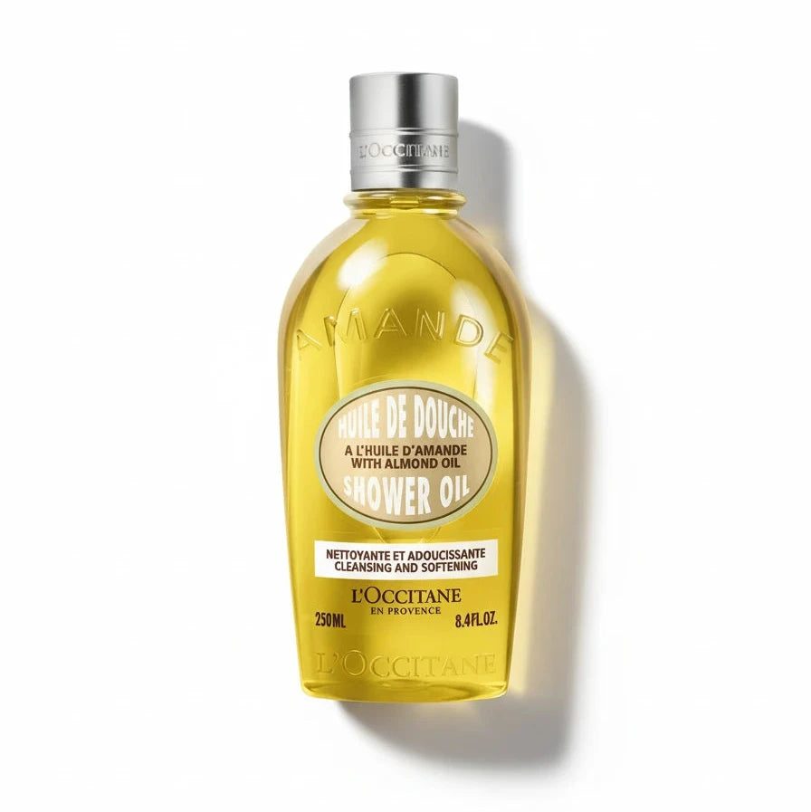 Yellow bottle of L'Occitane沐浴油 on a white background