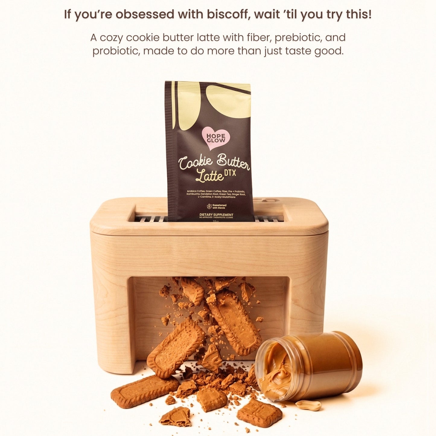 Cookie Butter Latte packaging with cookies and a wooden holder on a white background