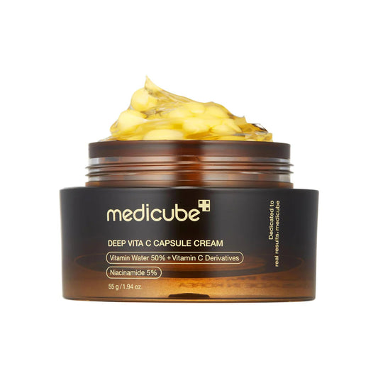 Jar of Medicube Deep Vita C Capsule Cream with cream visible on top