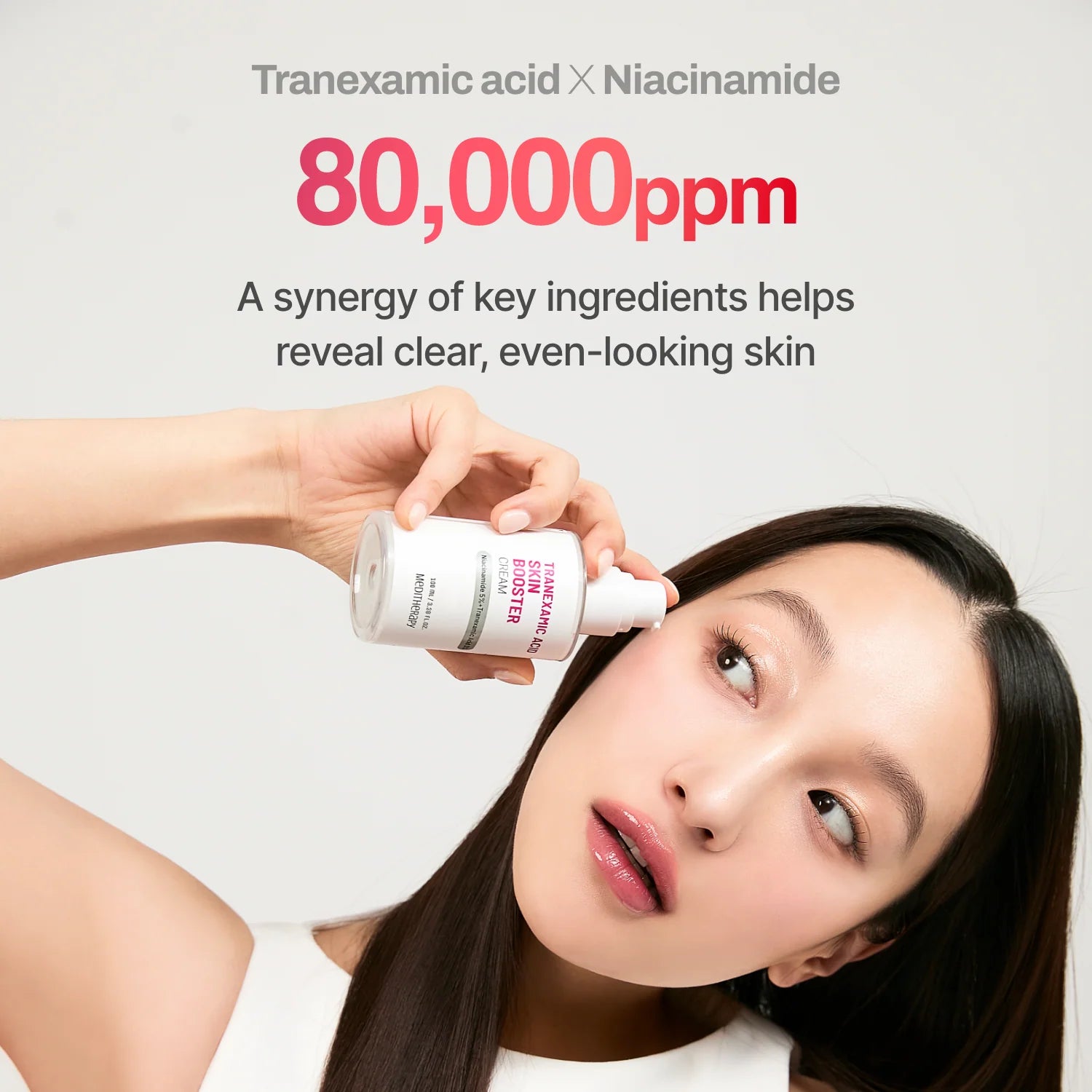 Woman applying skincare product with text about Tranexamic acid and Niacinamide on a white background