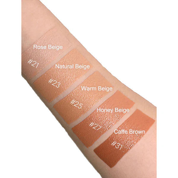 Color swatches of beige and brown shades on a skin-like background