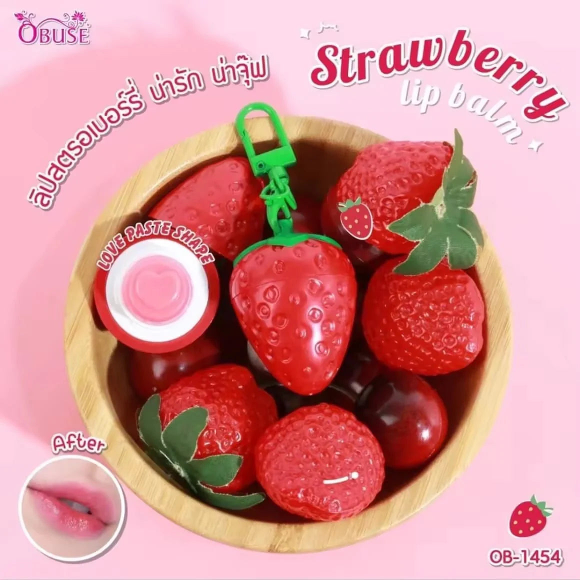 Strawberry-shaped lip balms in a wooden bowl with OBUSE branding on a pink background.
