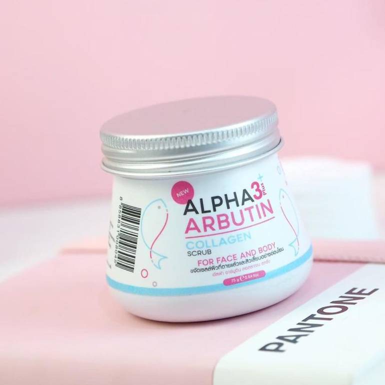Jar of Alpha Arbutin collagen scrub on a pink background