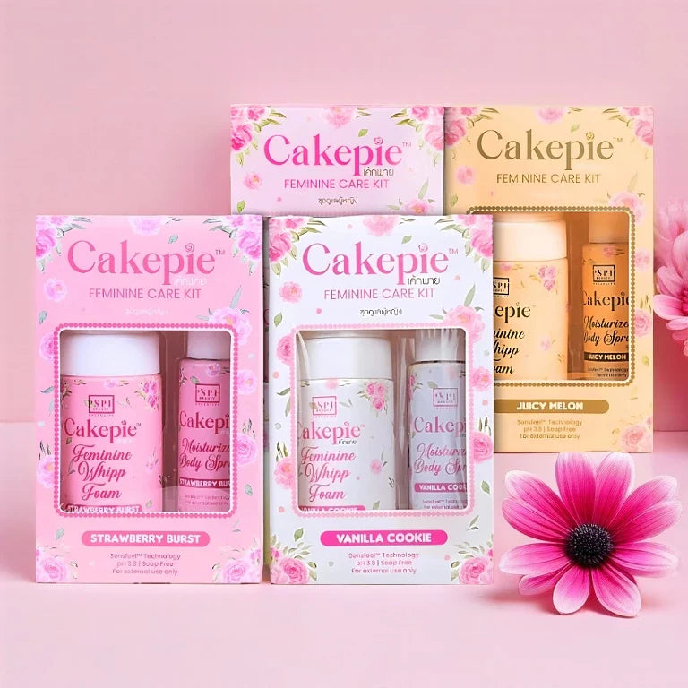 Cakepie feminine care products on a pink background with a flower.