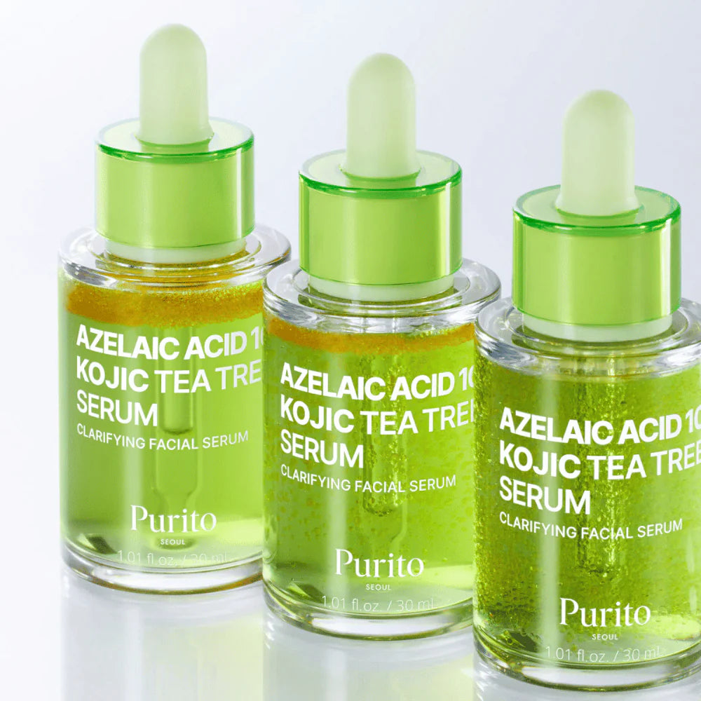 Three bottles of Purito Azelaic Acid 10% Kojic Tea Tree Serum on a white background