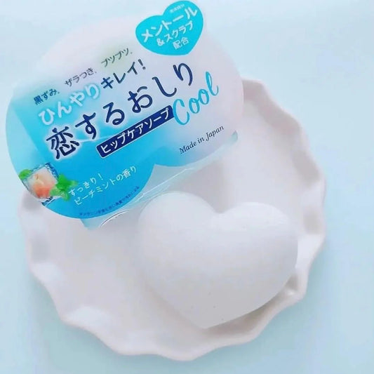 White silicone breast form with blue label on a light blue background