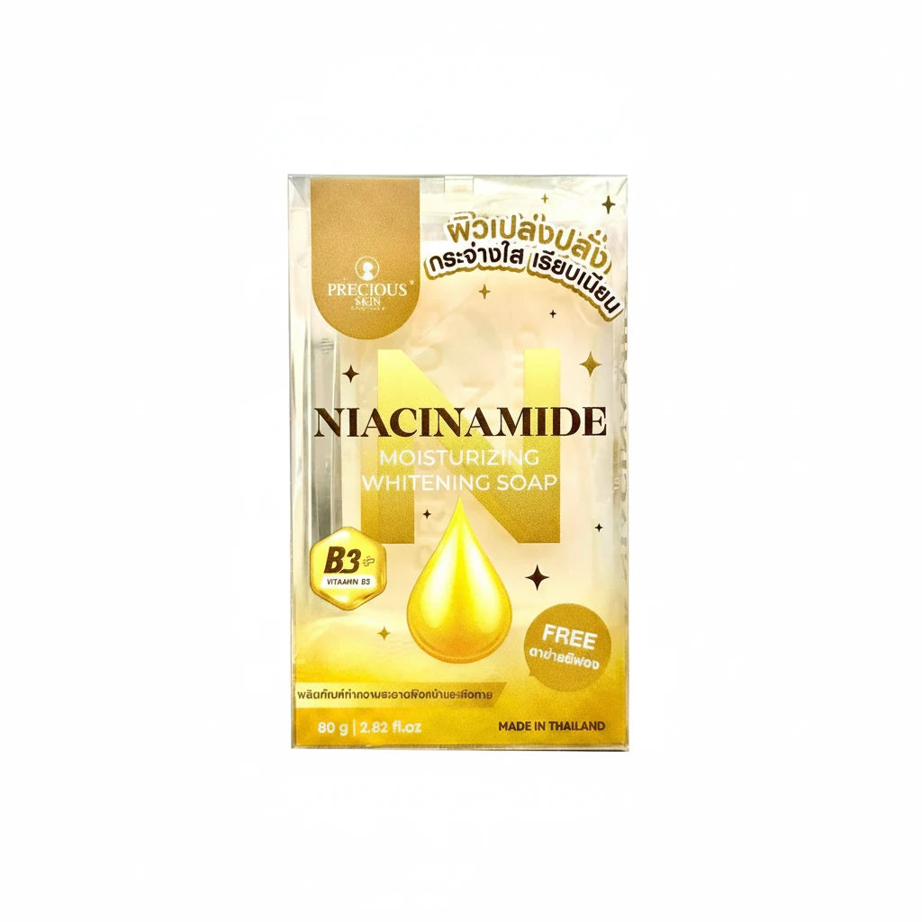 Package of Niacinamide soap with gold accents on a white background